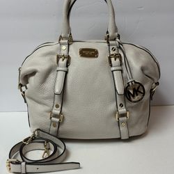 Michael Kors leather bag with both arm handles and shoulder strap. Michael Kors