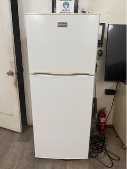 Compact all white Frigidaire fridge