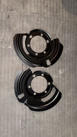 front left and right brake dust shields