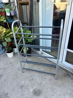Shoe rack  31 inches tall 21 inches long 9  inches wide