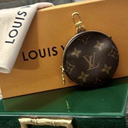 Authentic LOUIS VUITTON Brown Gold Monogram Coin Pouch