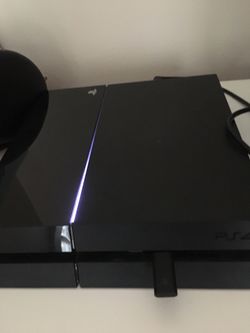 PS4 with PlayStation wireless headset and 2 controls with 6 games