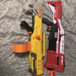 nerf guns, both working w/two drum mags