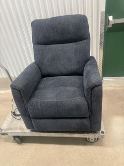 Blue Sitting pretty fully automatic recliner and sit to stand-sells for $900 -asking $350  Delivery available for a small fee
