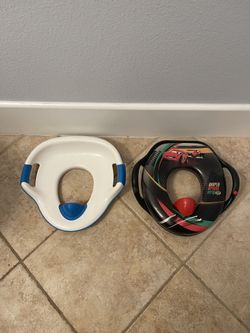 Potty Training Seat – Padded | World Grand Prix Cars Theme   Potty training seat in great condition, featuring a fun World Grand Prix Cars theme — per