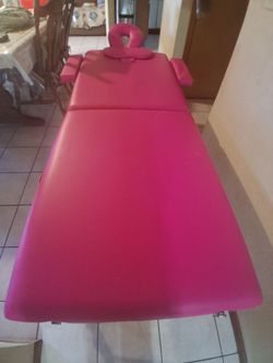 Pink massage table