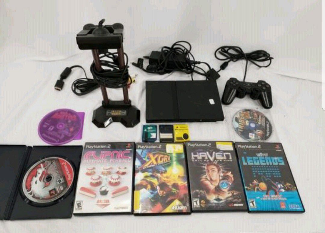 PS2 game consoles + 6 game + cam + 1 controller
