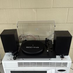 Record player with speakers