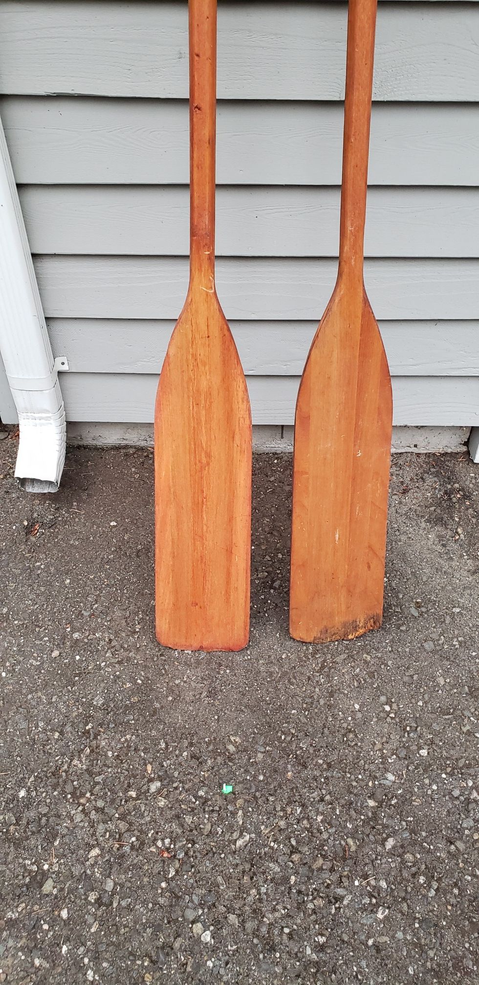 pair unsigned canoe paddles good condition