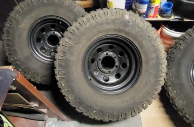 **15x10.5 6x5.5Wheels w/33x12.5 MT Tires. **