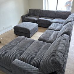 7 PC Sectional  Color Gray  New In  a Box  We Offer Delivery And Installation 