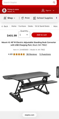 Desk with desk raiser