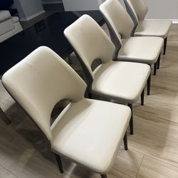 Brand new leather Dining chairs $500 for all 4 chairs. 
