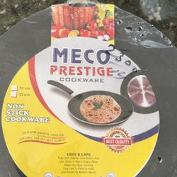 MECO  PRESTIGE  COOKWARE  31 cm  12” NON STICK COOKWARE  SUPERIOR SMOOTH NONSTICK  SUITABLE FOR ALL HEAT SOURCES  M  UARANTEED 100%  BEST QUALITY  