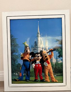Vintage 1980s Disney characters (Mickey, Goofy, Pluto) at Walt Disney World Florida