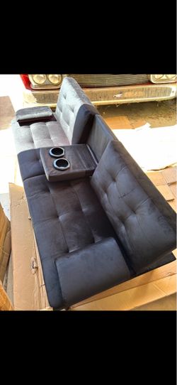 Black Tufted Sofa with Cup Holder Console