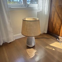 Ceramic table lamp with burlap drum shade