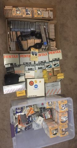 Assorted Camera Photography Equipment New Closed Camera Store Inventory