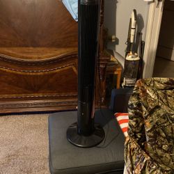 Oscillating tower fan with remote