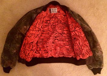 sub-zero weather protection camo jacket orange lining fabric