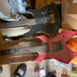 2 Guitars 50 Dollars