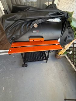 Grill used once with cover