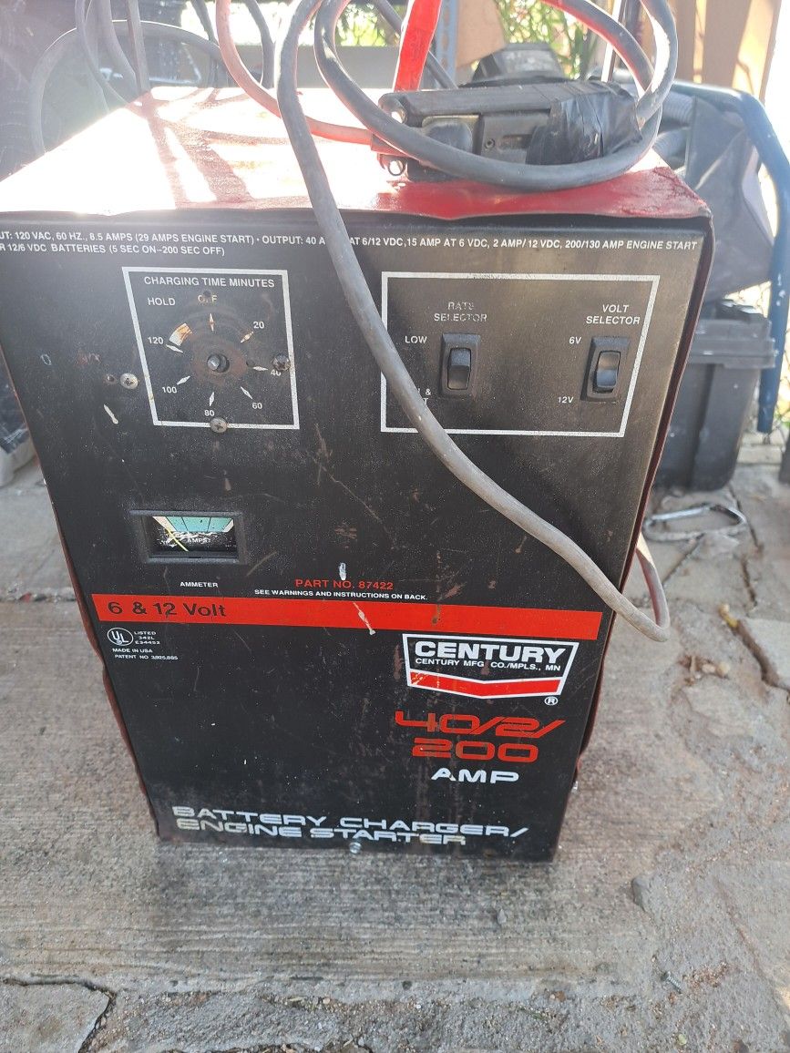 CENTURY CHARGER AND JUMPSTARTER 6 AND 12 DEEP CYCLE BATTERYS