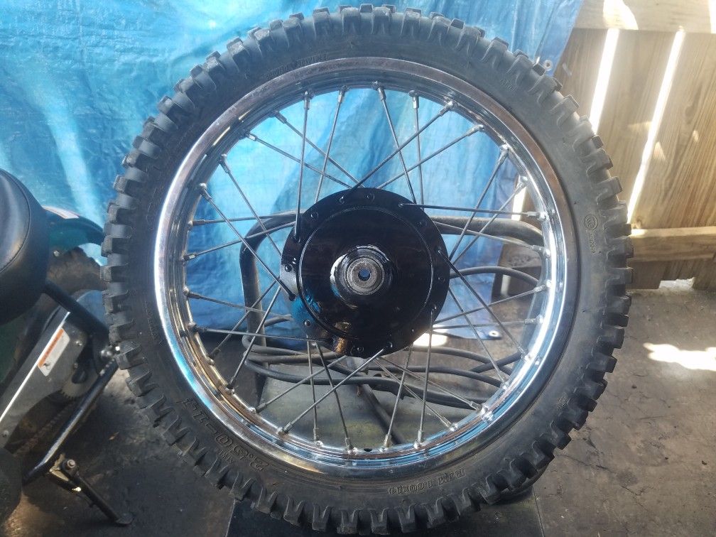 14''in dirt bike tire and rim 25$ for both