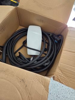 Tesla Charger with weather proof extension