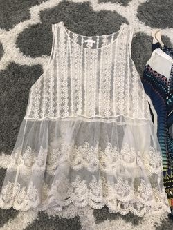Women’s/ Juniors size medium and large peasant tops