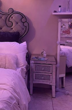 2 glass nightstands