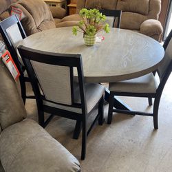Brand new dinette and four chairs for 799