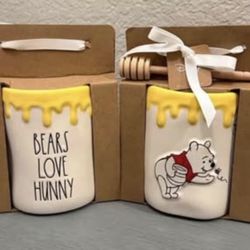 $18 each..  New Rae Dunn  Disney Winnie-the-Pooh collection - BEARS LOVE HUNNY doublesided mug with honey stick.  Please pickup in the area of 36th Av