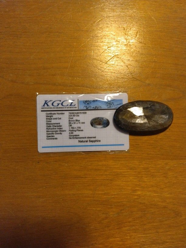 224.50 CT Brown Blue Oval Natural Sapphire With Kgcl Certificate Of Authentication 