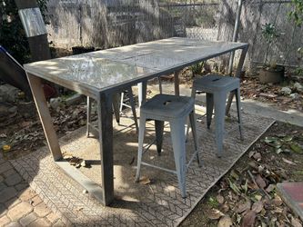 Metal and stone outdoor dining table with stools!