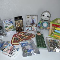 Toys set all $20
 disney
 Fisher-Price
 Monopoly
 Trade cards
 Dinosaurs 
 Dices