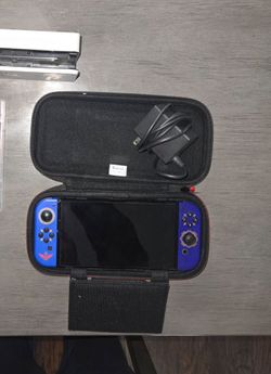 nintendo switch OLED with zelda joycons