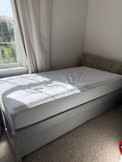 Grey Twin size bed / mattress for sale