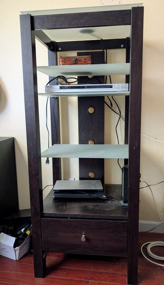dark wood and glass media storage shelf, four adjustable shelves and drawer