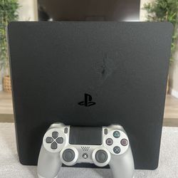 PlayStation 4 Slim Black 1TB Console with Silver Sony PS4 Controller