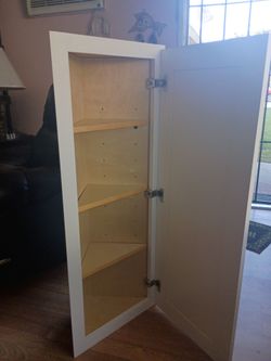 White coner cabinet