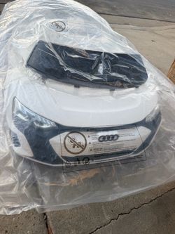 Brand new white Audi RE e-trim GT ride on