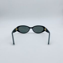 GG Sunglasses in Black With A Gold Logo And Sophisticated style
