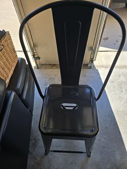 Black metal high-back chair