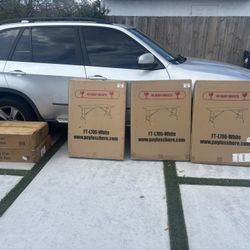 Folding Table And 12 Chairs. Box Not Open