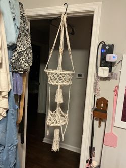 A beautiful hand made flower holder from the ceiling