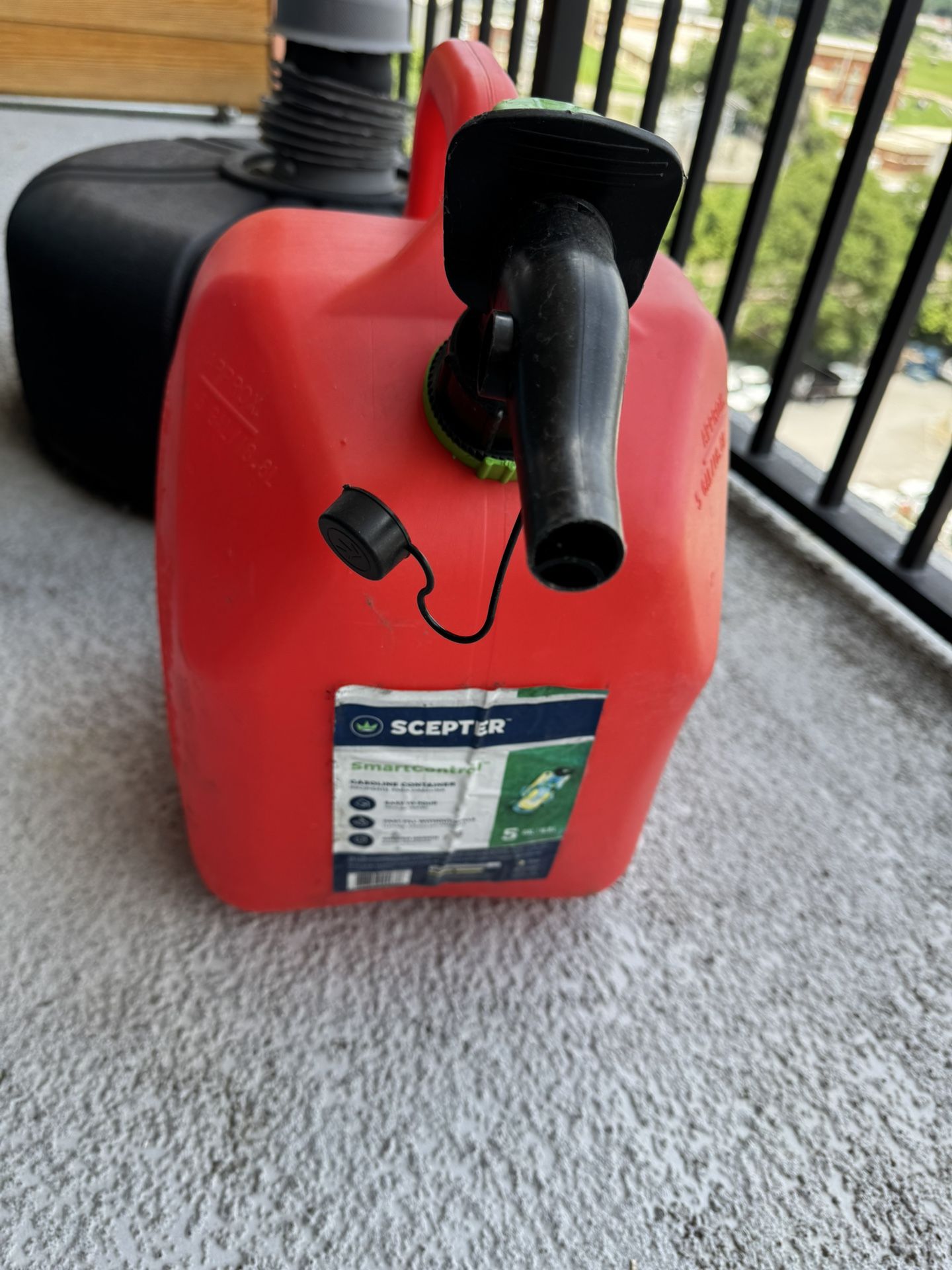 5-gallon Scepter gas can with spout.