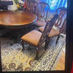 Ashley Furniture -Four chairs and A Table 