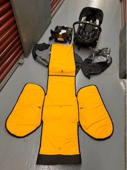 Doona+ Car Seat/Stroller with Base and accessories