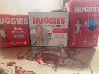 Box of Baby Wipes and 2 Diaper Bags